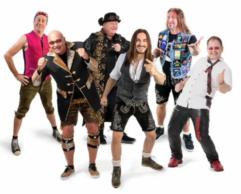 Die Oktoberfest-Band Münchner Zwietracht bei einem Live-Auftritt auf einer Bühne. Jetzt buchen bei der MH Eventagentur
